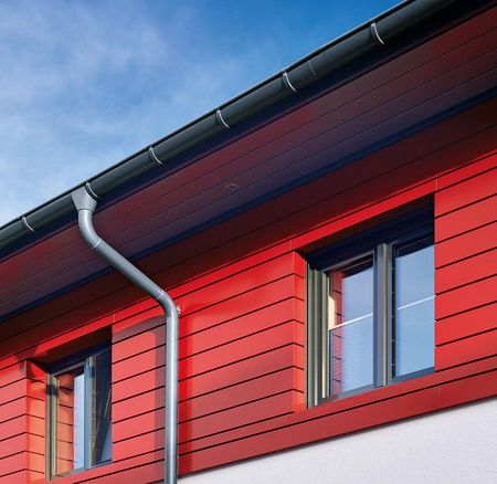 Tagafvanding i prePATINA schiefergrau til rød artCOLOR facade Tagafvanding i prePATINA schiefergrau til rød artCOLOR facade